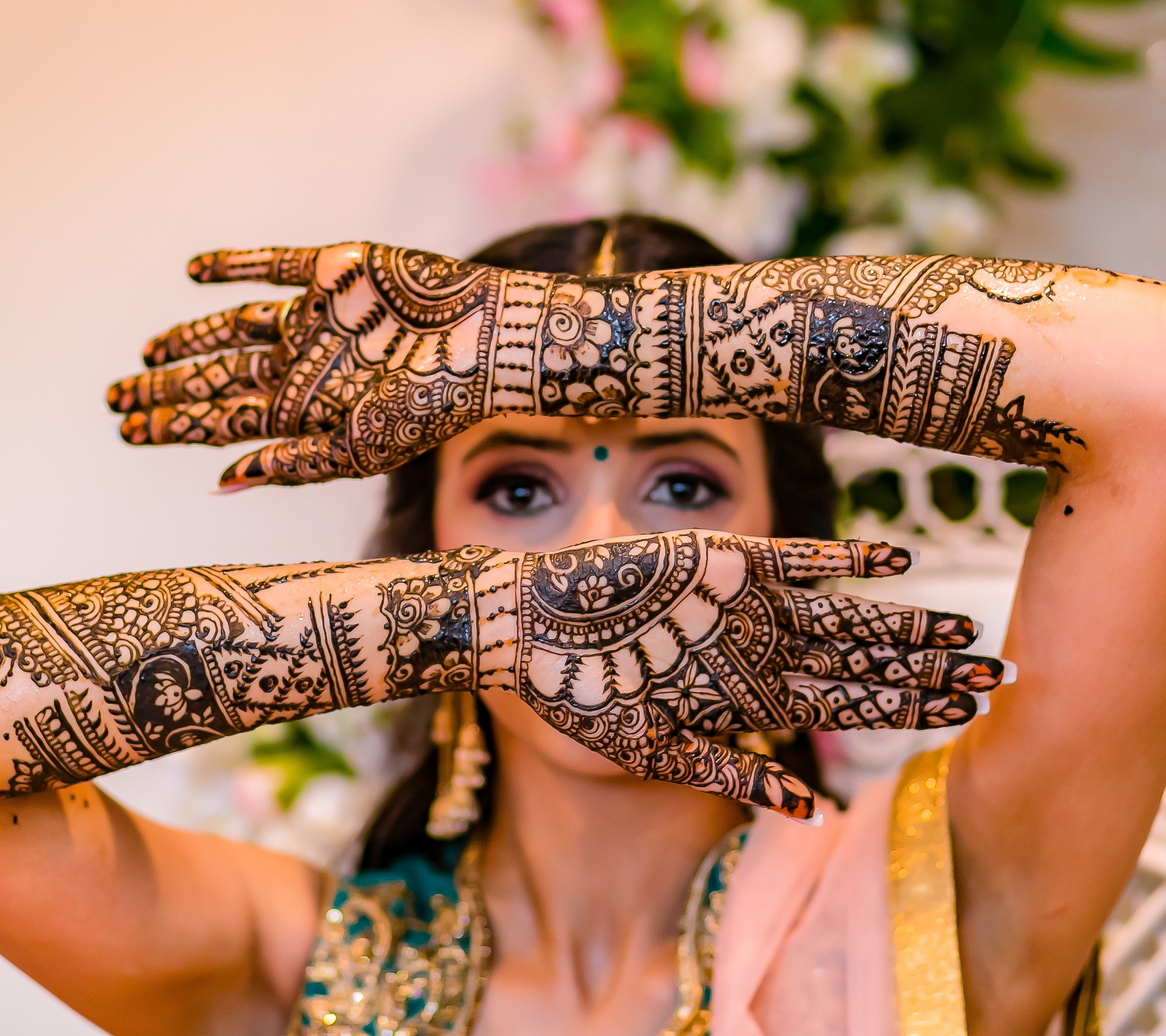 10 Must-Try Mehendi Hand Poses to Flaunt Your Stunning Bridal Designs