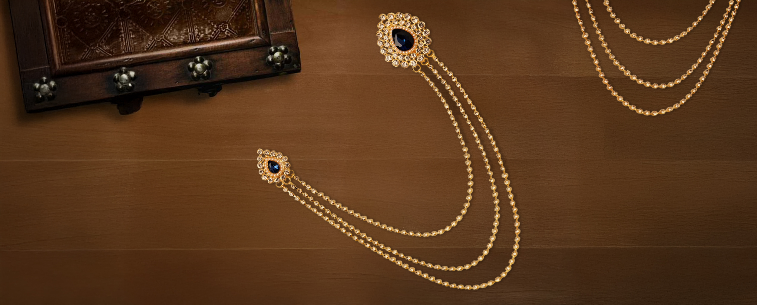 Elegant pearl-embellished chain brooch, a perfect accessory for a groom's sherwani.